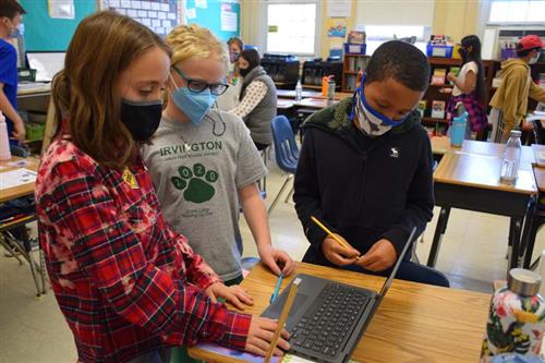 Students Working Together In The Classroom